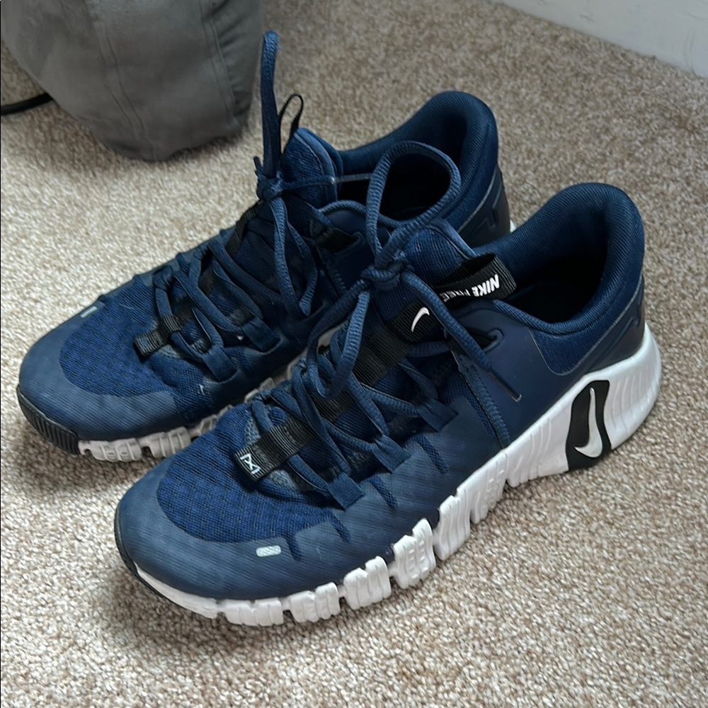 Nike Blue and White Athletic Shoes with Dynamic Design